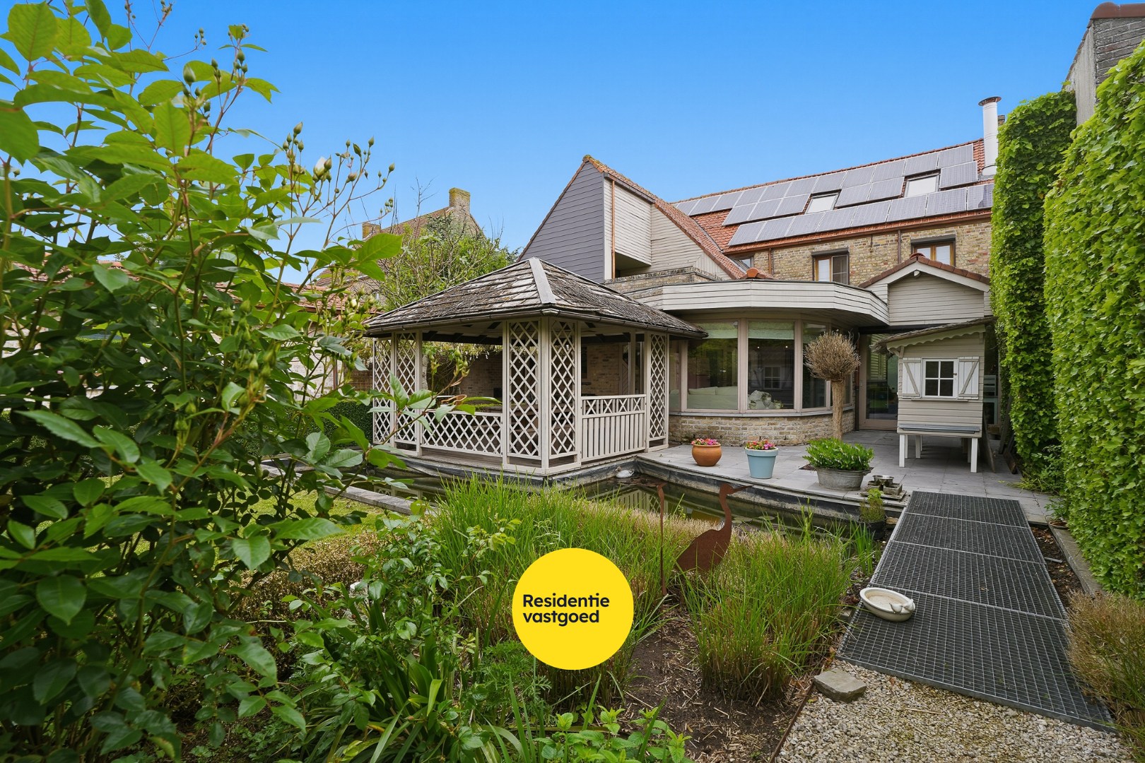 Unieke woning met polyvalente ruimte en zonnige tuin. 