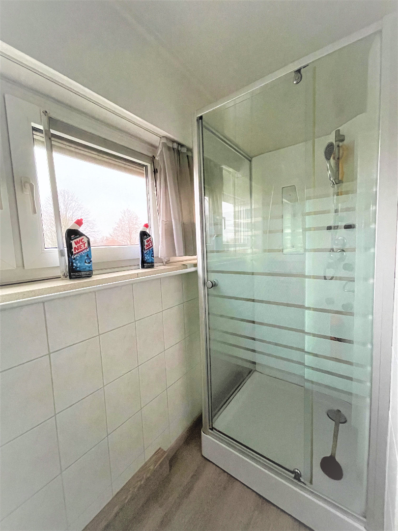 Woning met 3 slaapkamers en garage in rustige buurt 