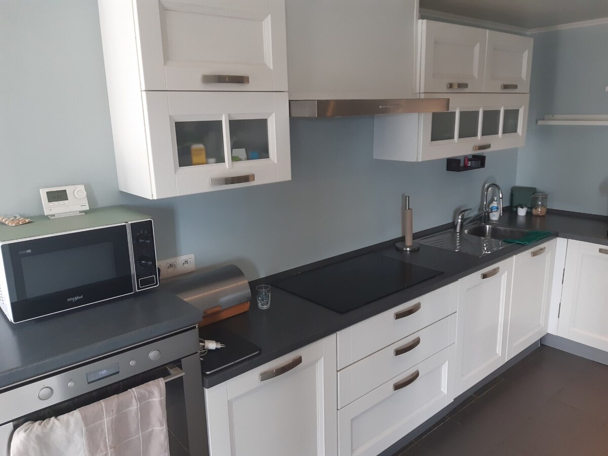 Praktische gezinswoning met leuke tuin. 