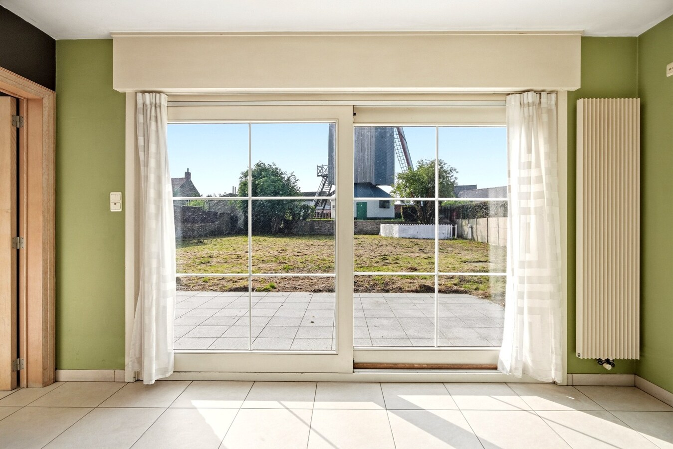 Ruime halfopen woning met 5 slaapkamers te koop in Werken met garage en ruime tuin! 