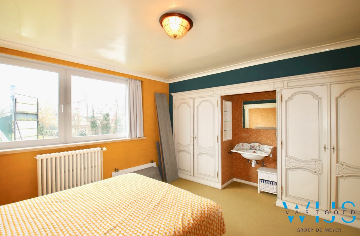 Statig woonhuis op 1104 m² in het centrum van Sleidinge ! 