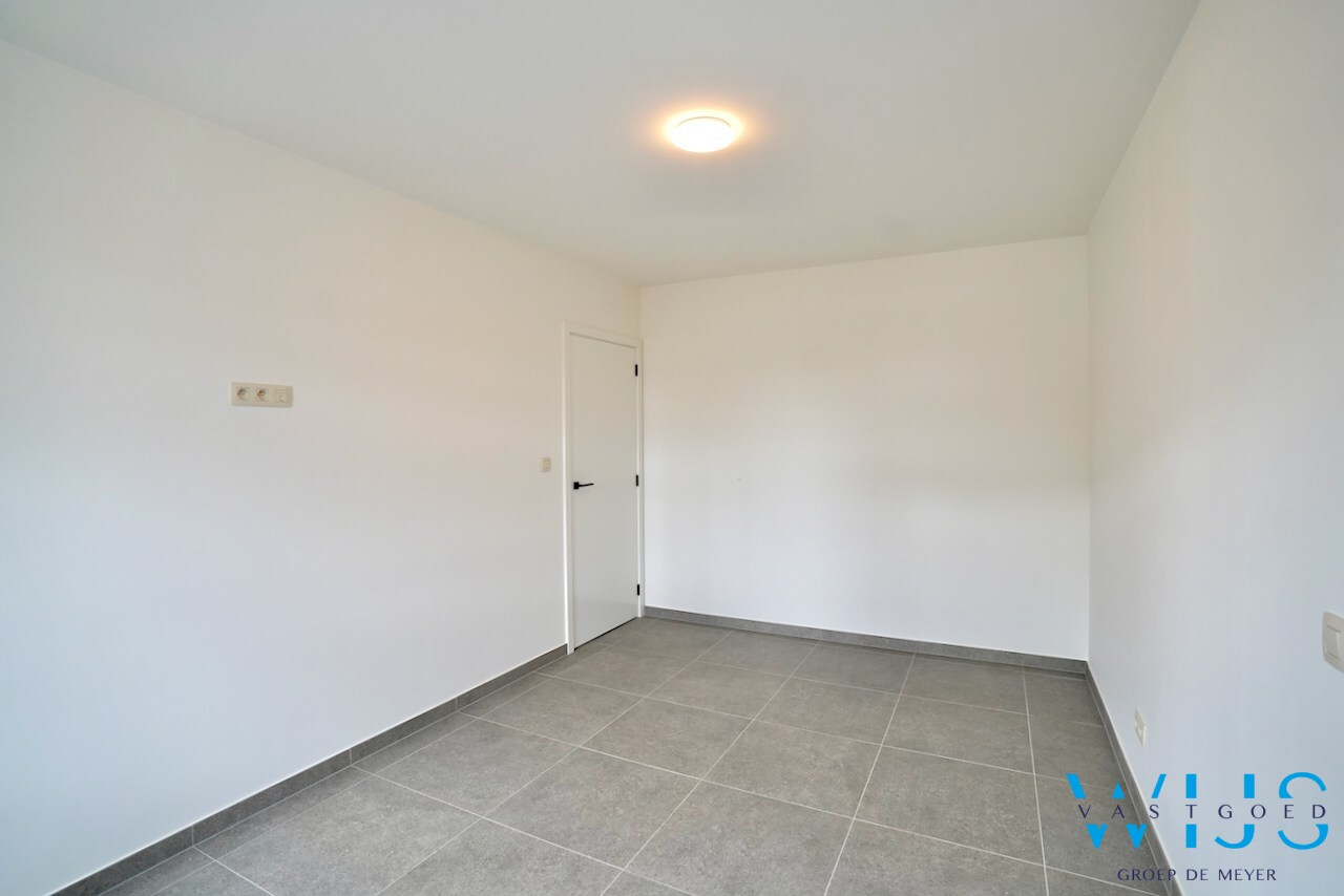 Drieslaapkamer appartement met garage in hartje Ertvelde ! 