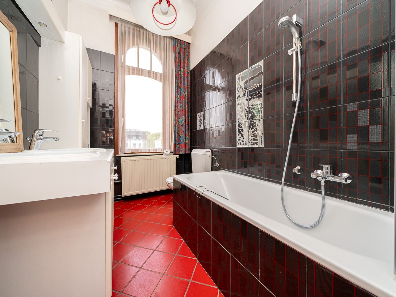 Knappe herenwoning met praktijkruimte en tuin 