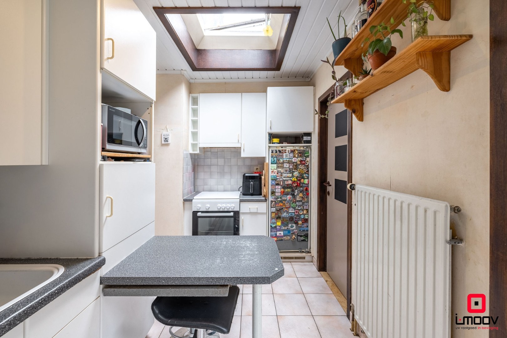 Karaktervolle stadswoning met uitzonderlijke breedte en garage in hartje Gent 