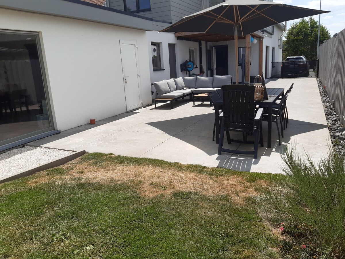 Praktische gezinswoning met leuke tuin. 