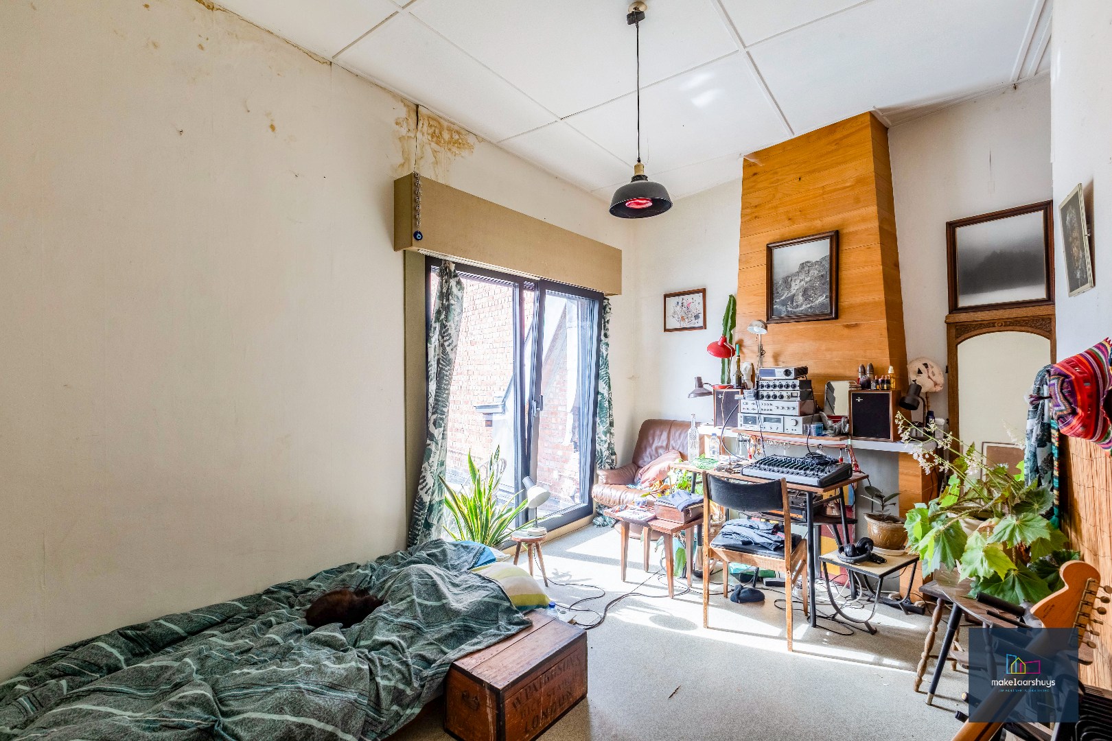 Woning met 3 slaapkamers en verrassende tuin met bijgebouwen 