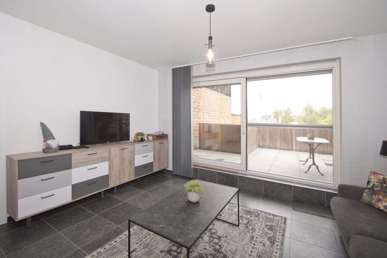 Instapklaar appartement met lift - 1 slpk, terras, 2 parkings 