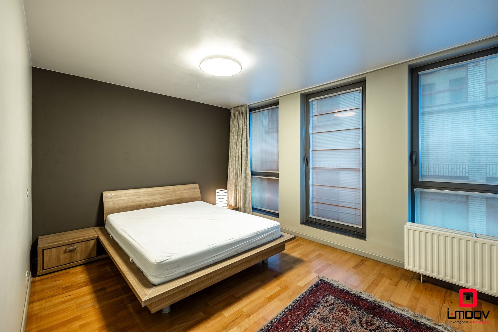 Ruim en lichtrijk appartement met uitzonderlijk terras en autostaanplaats in hartje Gent 
