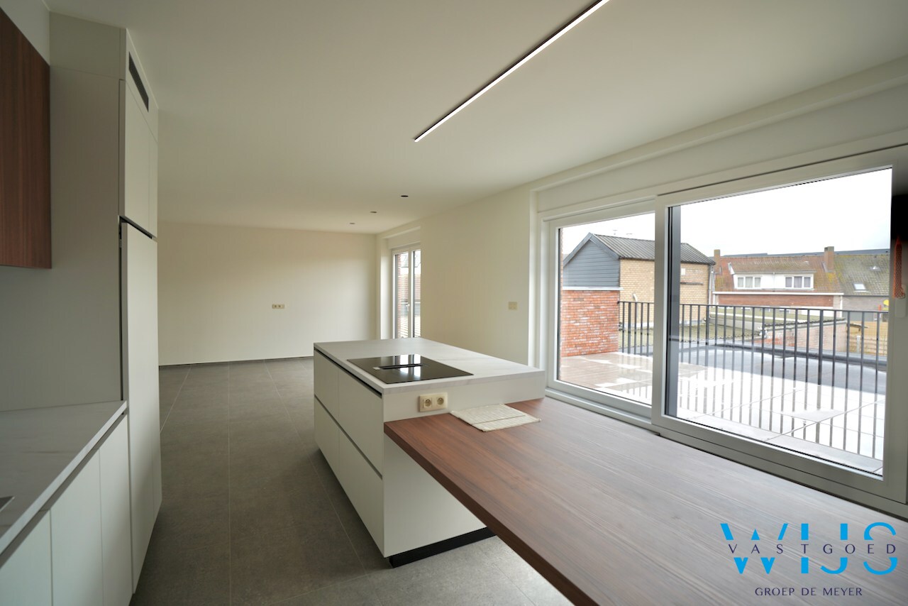 Drieslaapkamer appartement met garage in hartje Ertvelde ! 