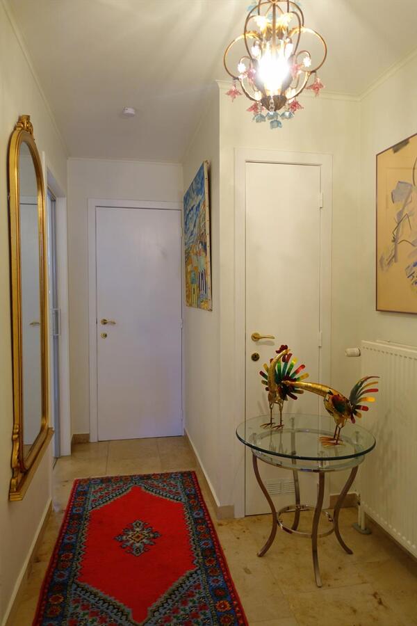 Gelijkvloers appartement met zuidgerichte tuin 