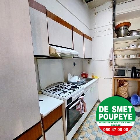 Handelshuis gelegen in de toeristische straat van Brugge 