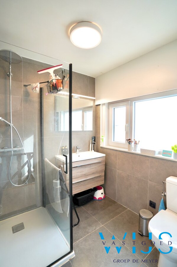 Toffe gezinswoning met garage in het CENTRUM VAN ERTVELDE ! 