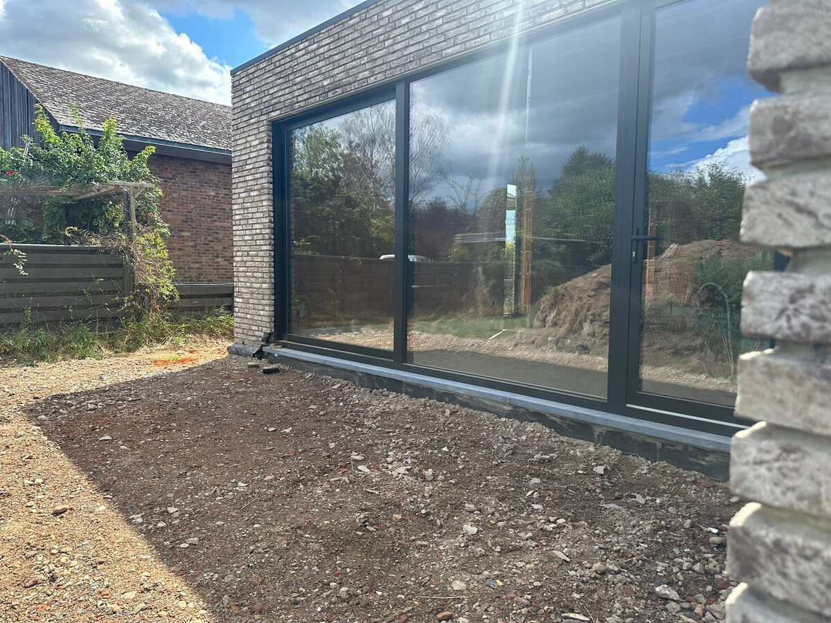 Mijmeren over de velden - in een luxueuze half open nieuwbouwwoning in Rotem 