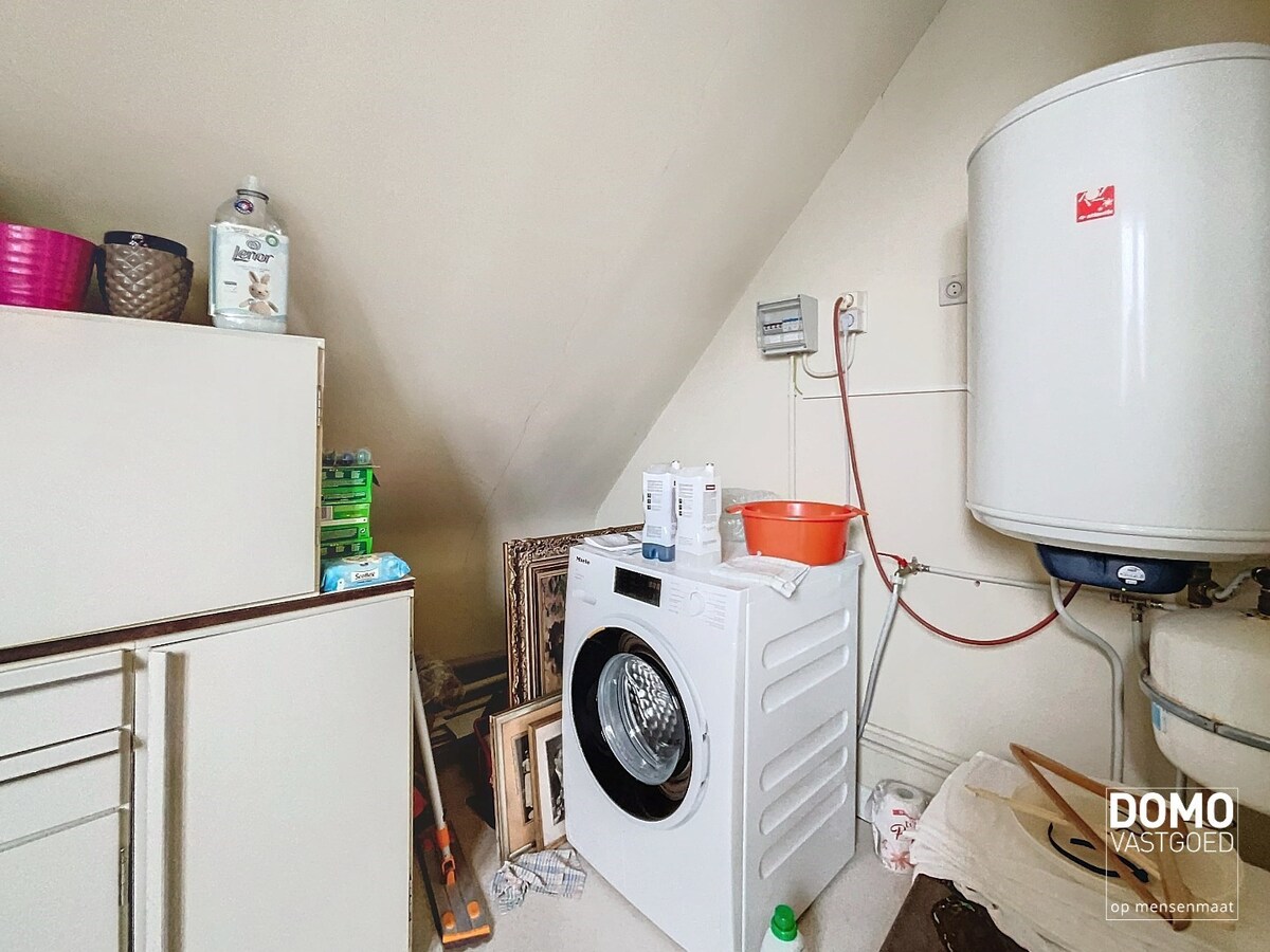 RUIME GEZINSWONING MET TUIN EN GARAGE TE KERMT 