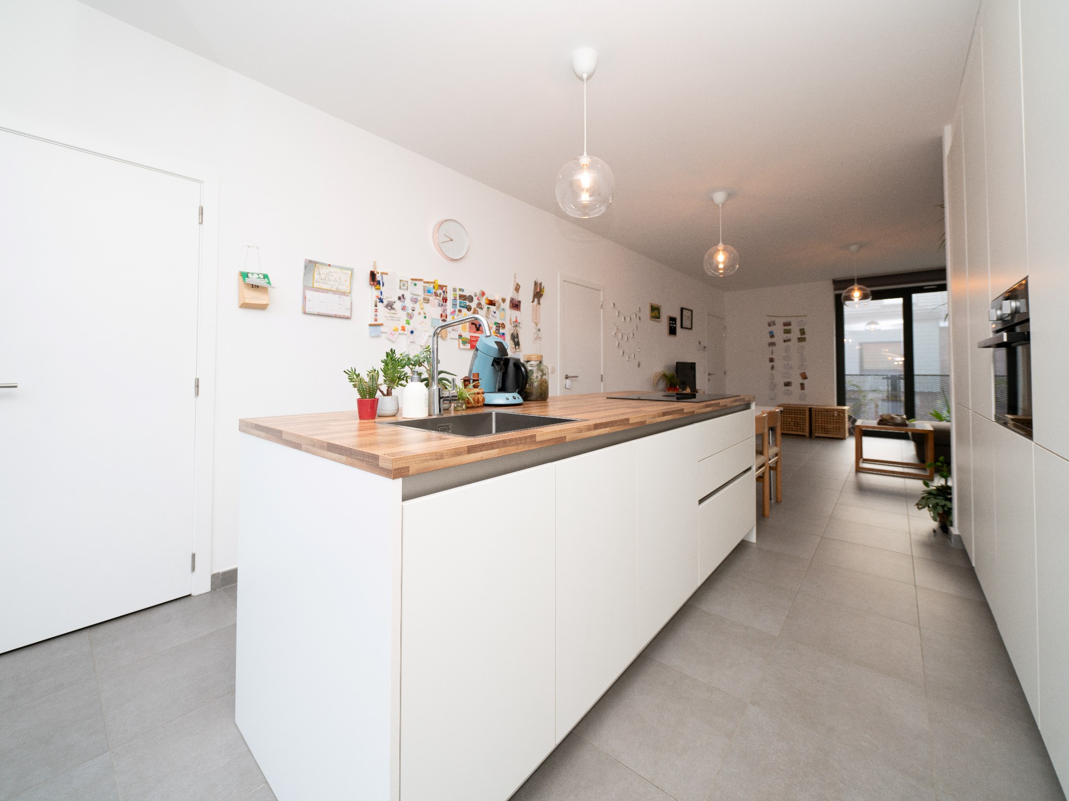 Nieuwbouwappartement met 3 terrassen, staanplaats en kelder 