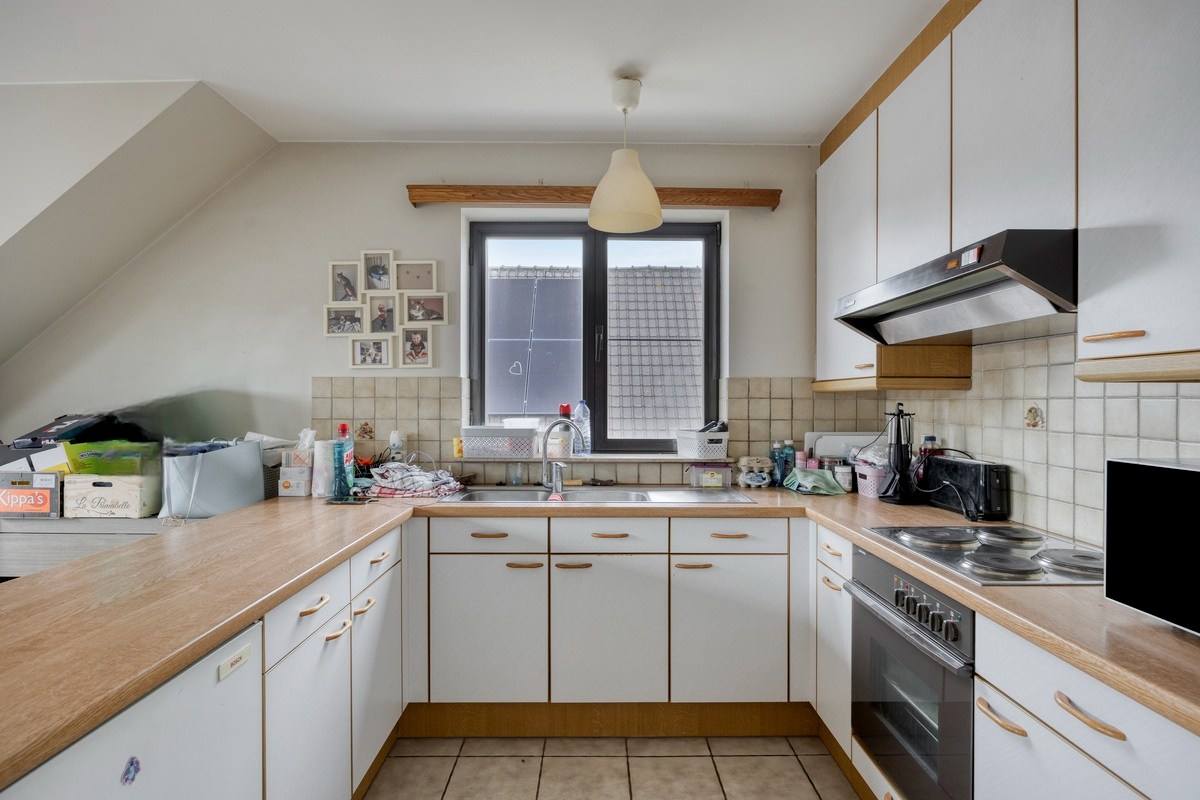 Opbrengsteigendom met 3 appartementen en 7 garages 