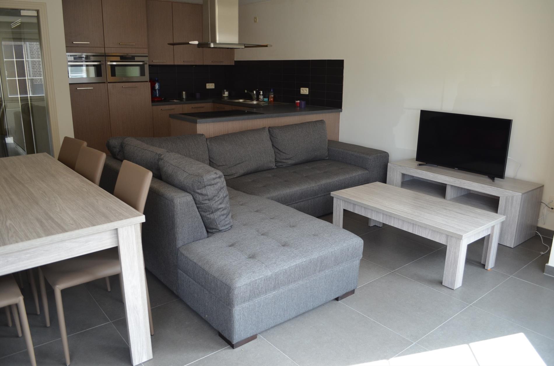 Gelijkvloers appartement met 2 slpks, terras, tuin en garage te Maldegem 