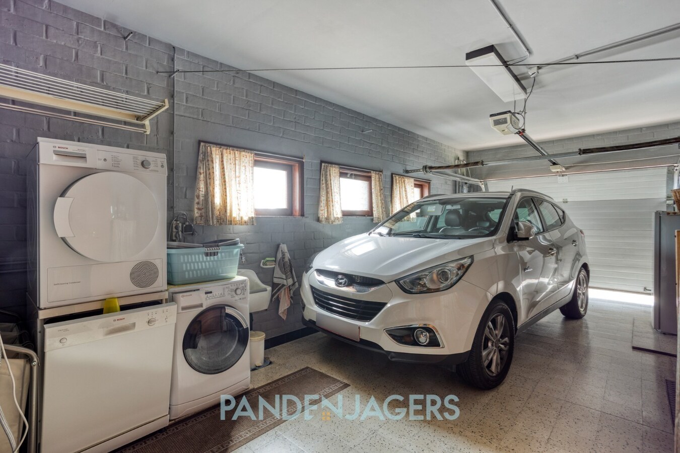 Ruime open bebouwing met groot bijgebouw te Duffel 