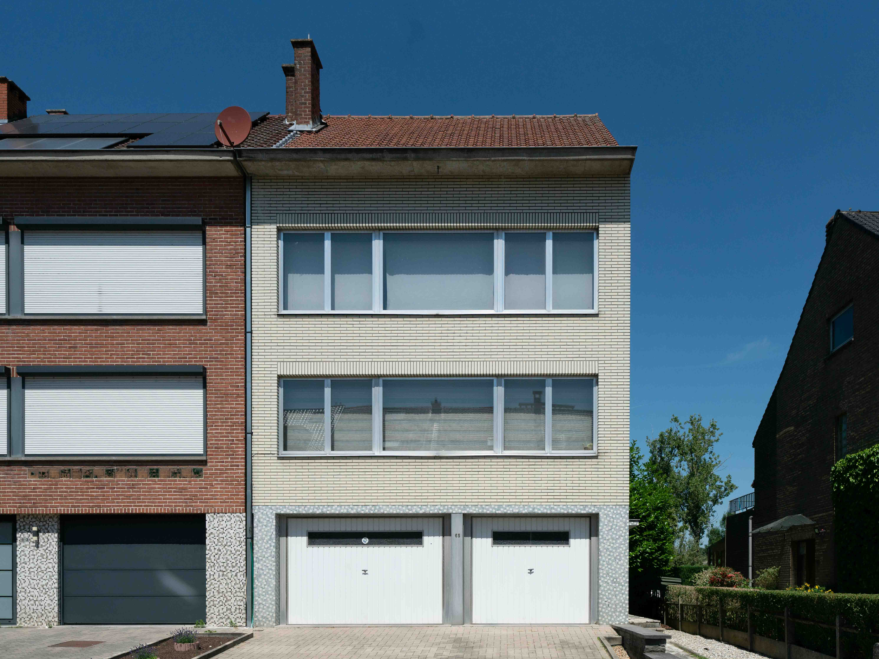 Maison (kangourou) très spacieuse avec jardin et double garage 
