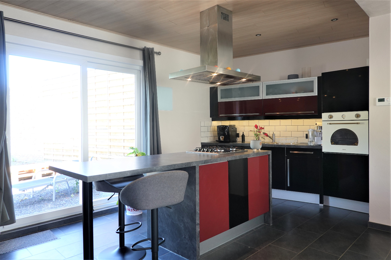 Knusse woning met grote tuin 