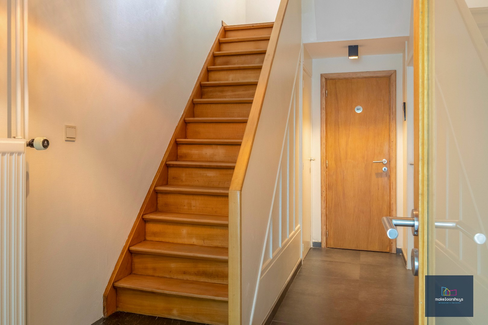 VERKOCHT ! Instapklare energiezuinige handelswoning met tuin en garage 