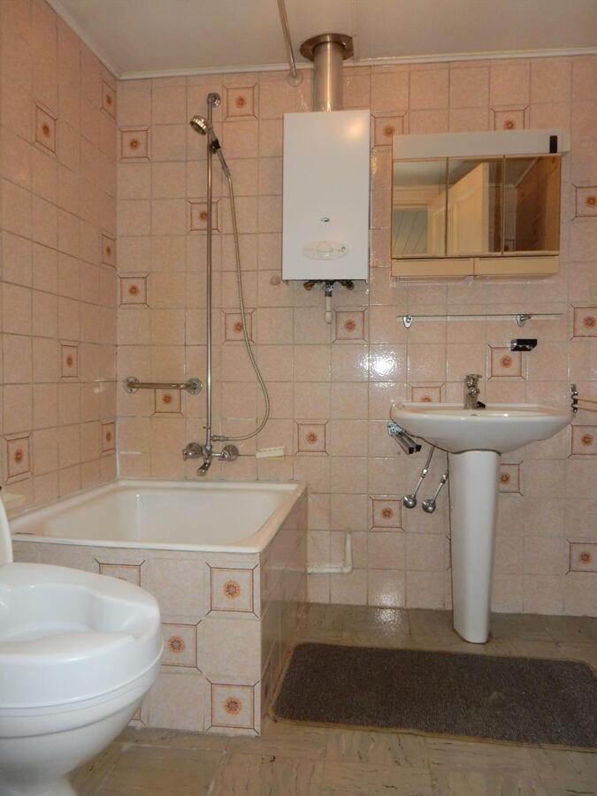 Te renoveren woning op een rustige ligging in de dorpskern 