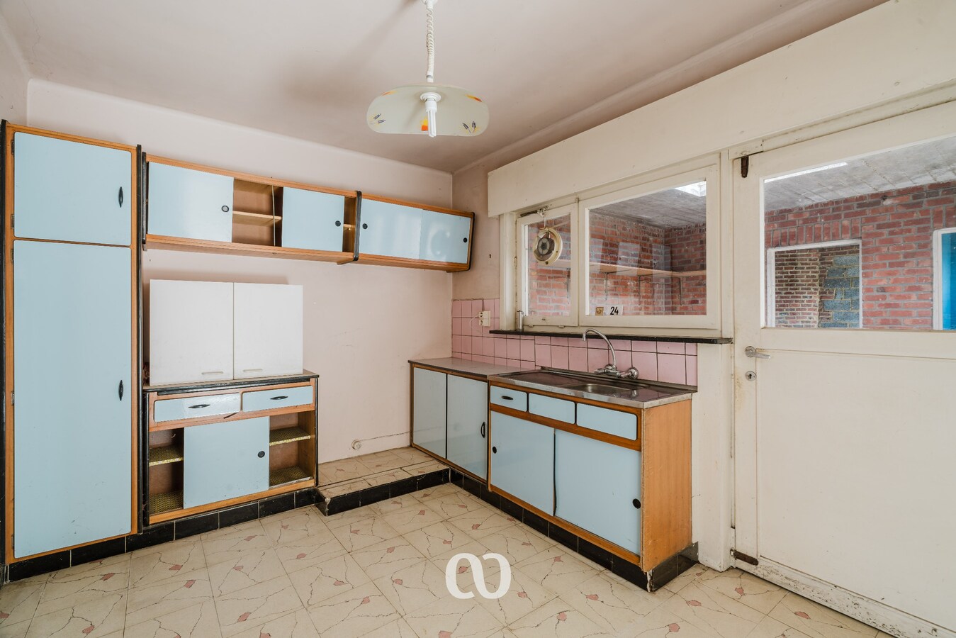 Te renoveren gezinswoning met 4 slaapkamers en tuin in Oudenaarde 
