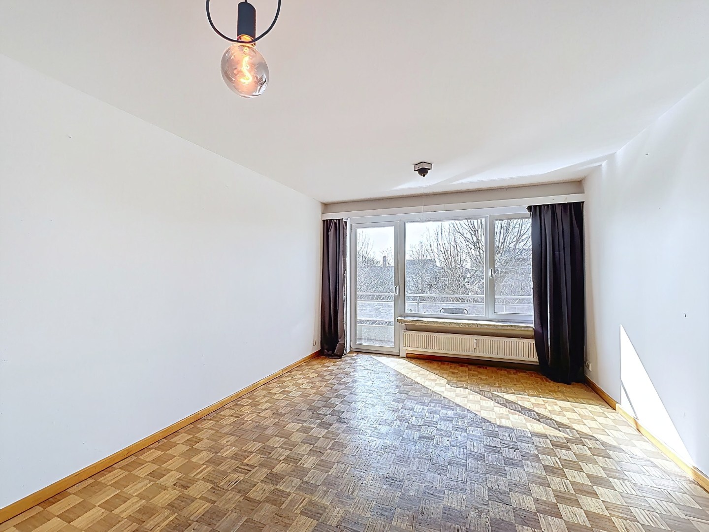 Appartement met slaaphoek en zonnig terras gelegen aan de Coupure 