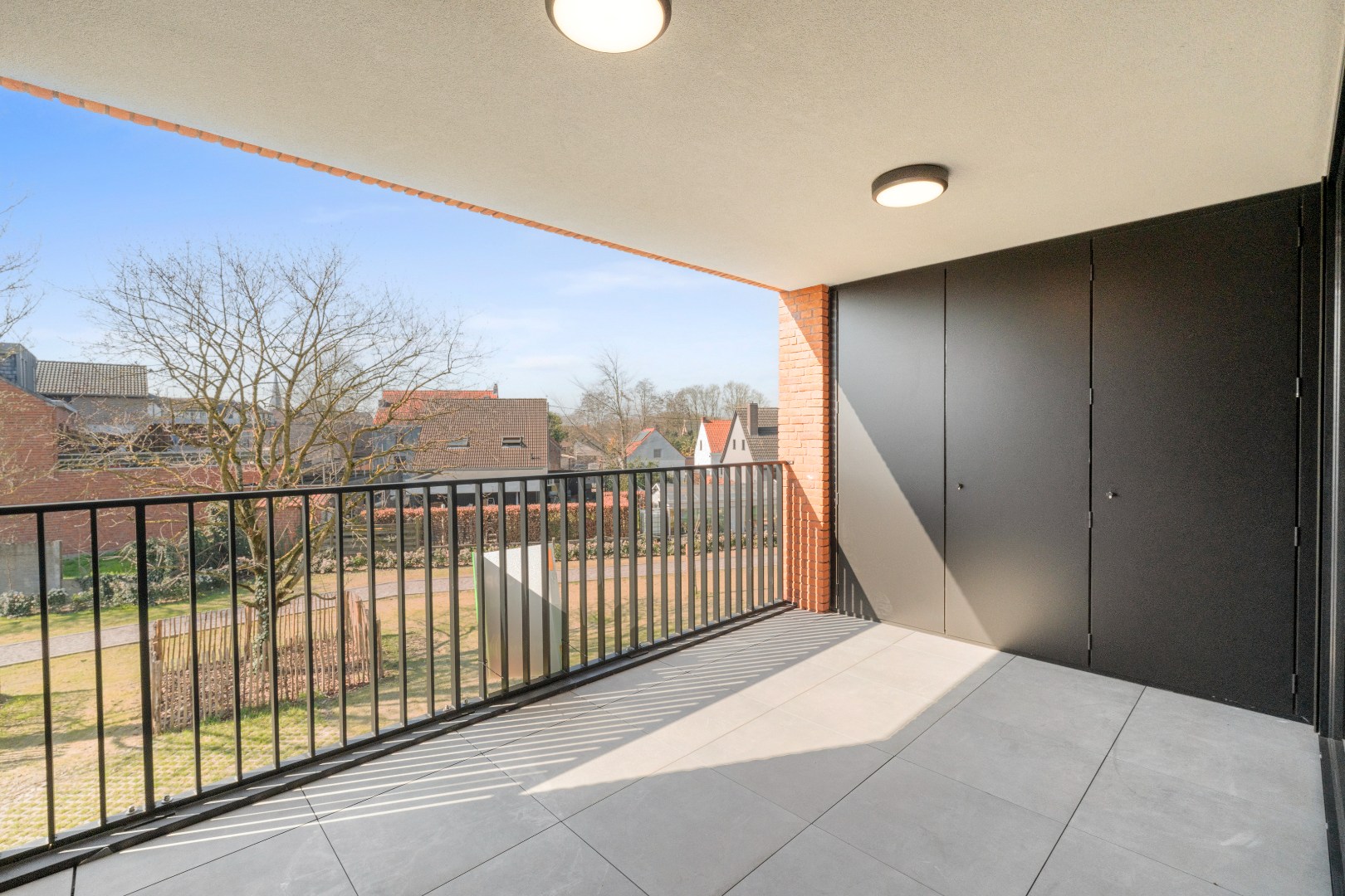 Nieuwbouwappartement met één slaapkamer, terras en ondergrondse autostaanplaats te koop in Zulte 