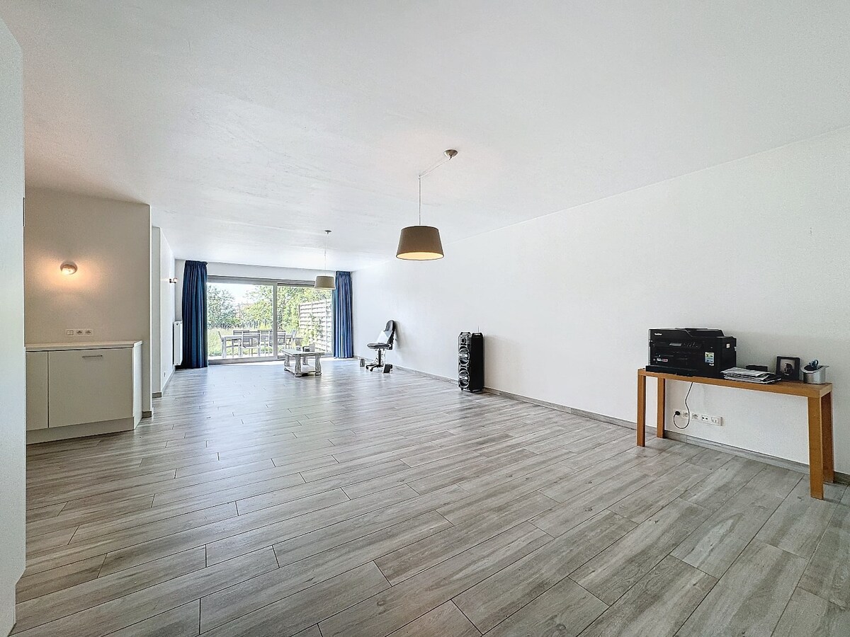 Recent (2017) gelijkvloers appartement met grote tuin te Ophasselt 