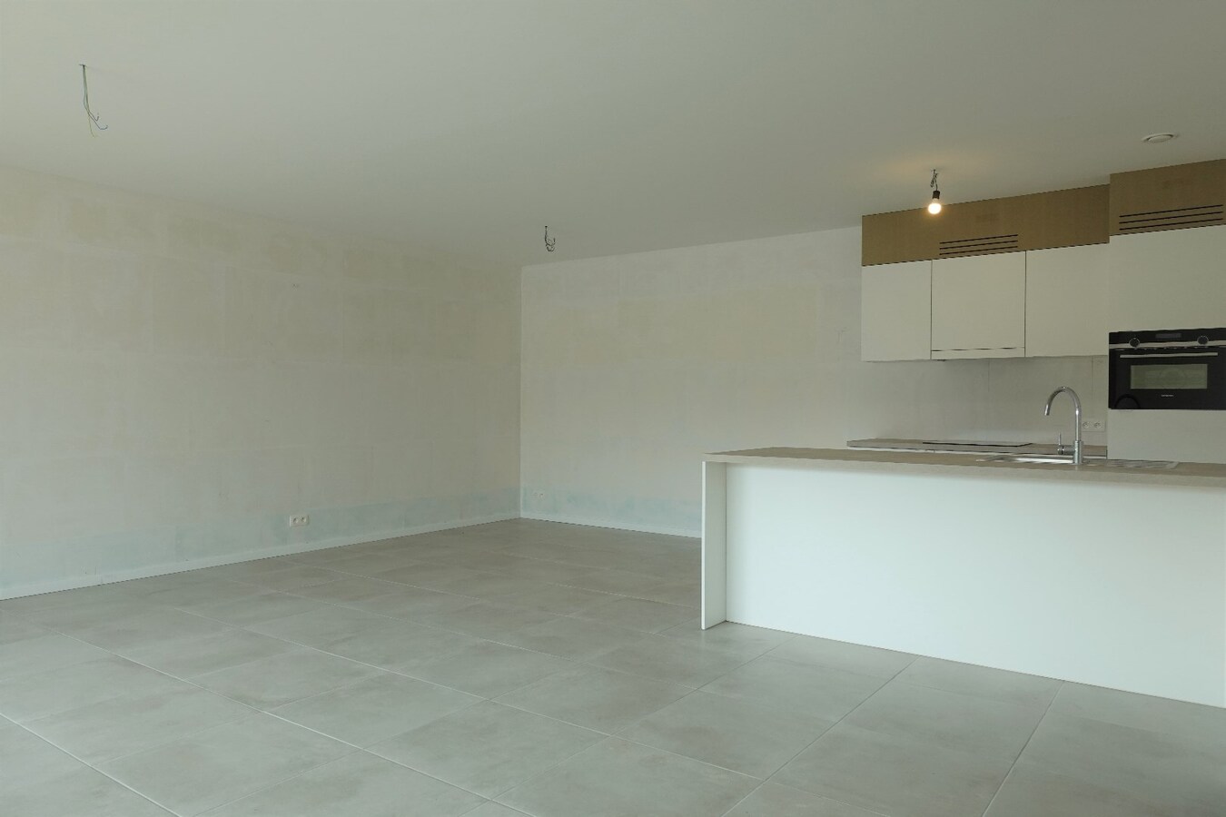 Nieuwbouwappartement met terras en tuin 