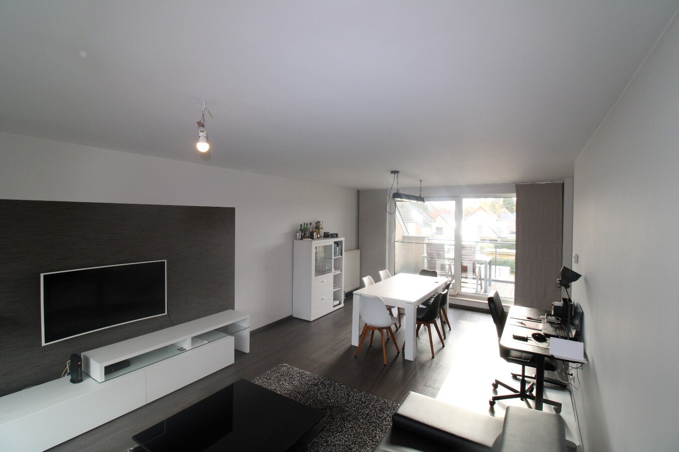 Centraal gelegen appartement met terras, kelderberging en staanplaats 