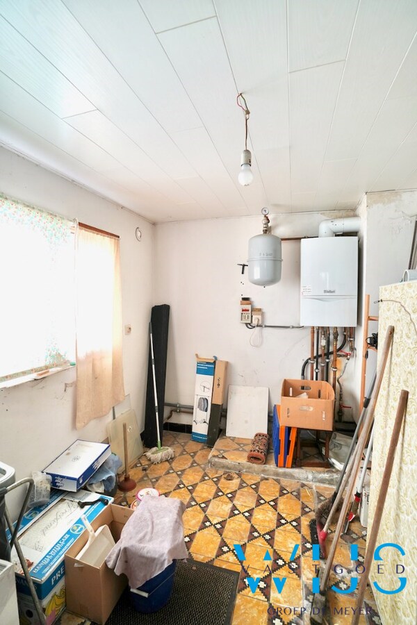 Volwaardig woonhuis met bijgebouwen te Wippelgem ! 