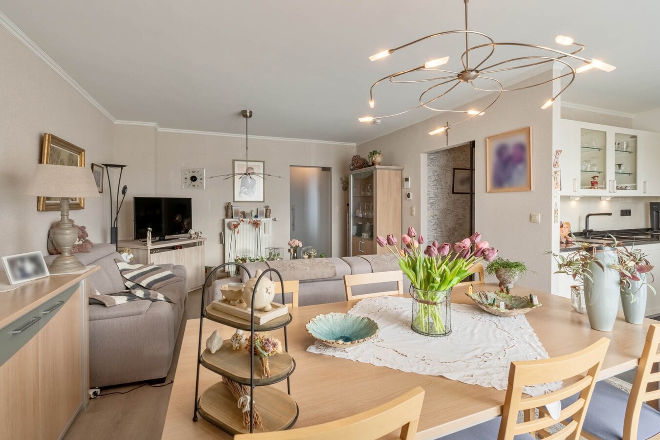 Comfortabel investeringsappartement met 2 slaapkamers en garage, in dorpskern 