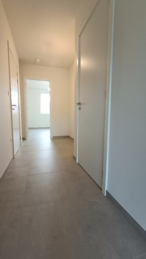Nieuwbouwappartement met tuin en terras 