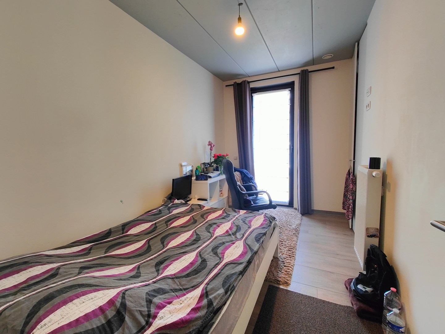 Recent appartement op het 1e verdiep met ruim terras en garage 