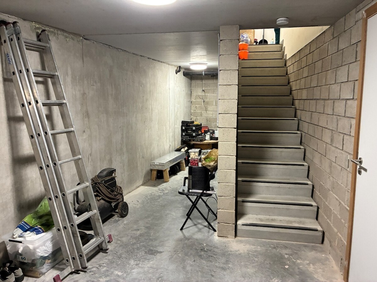 Nieuwbouwwoning op 50m van tramhalte - met terras en tuin ! 