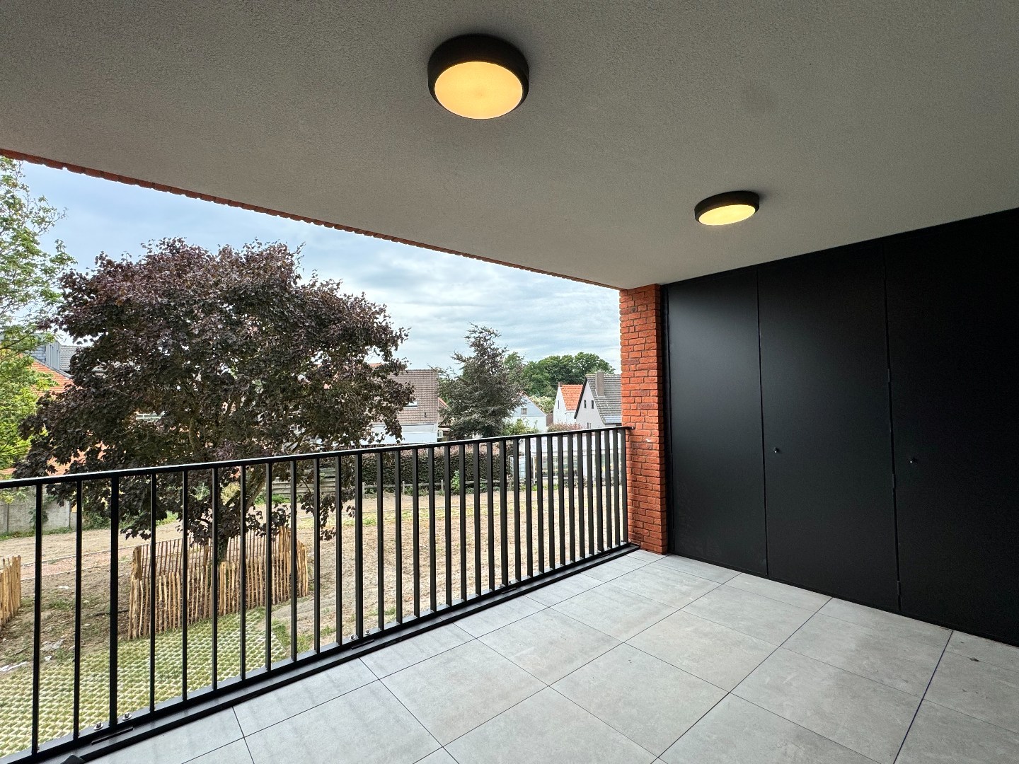 Nieuwbouwappartement met één slaapkamer, terras en ondergrondse autostaanplaats te koop in Zulte 