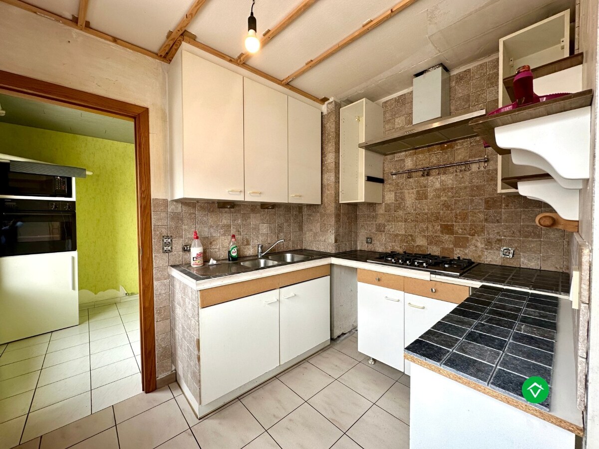 Ruim duplexappartement met terras en garage nabij centrum Roeselare 