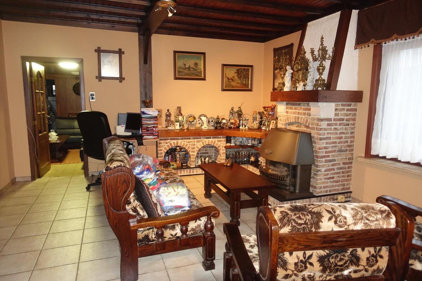 Degelijke woning met groot bijgebouw 