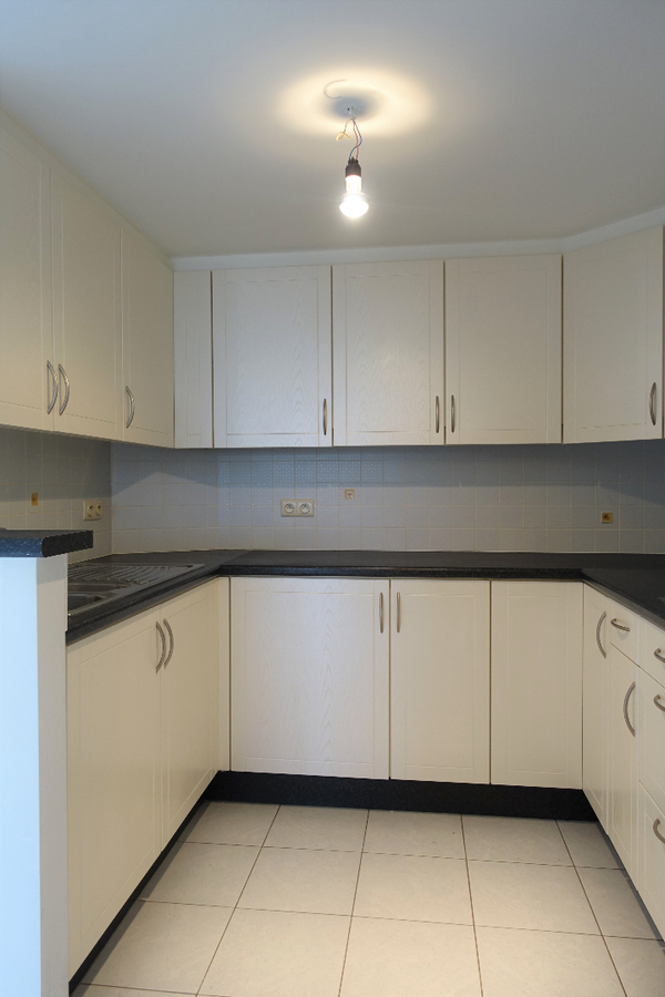 Lichtrijk duplex-appartement met 2 terrassen in het centrum 