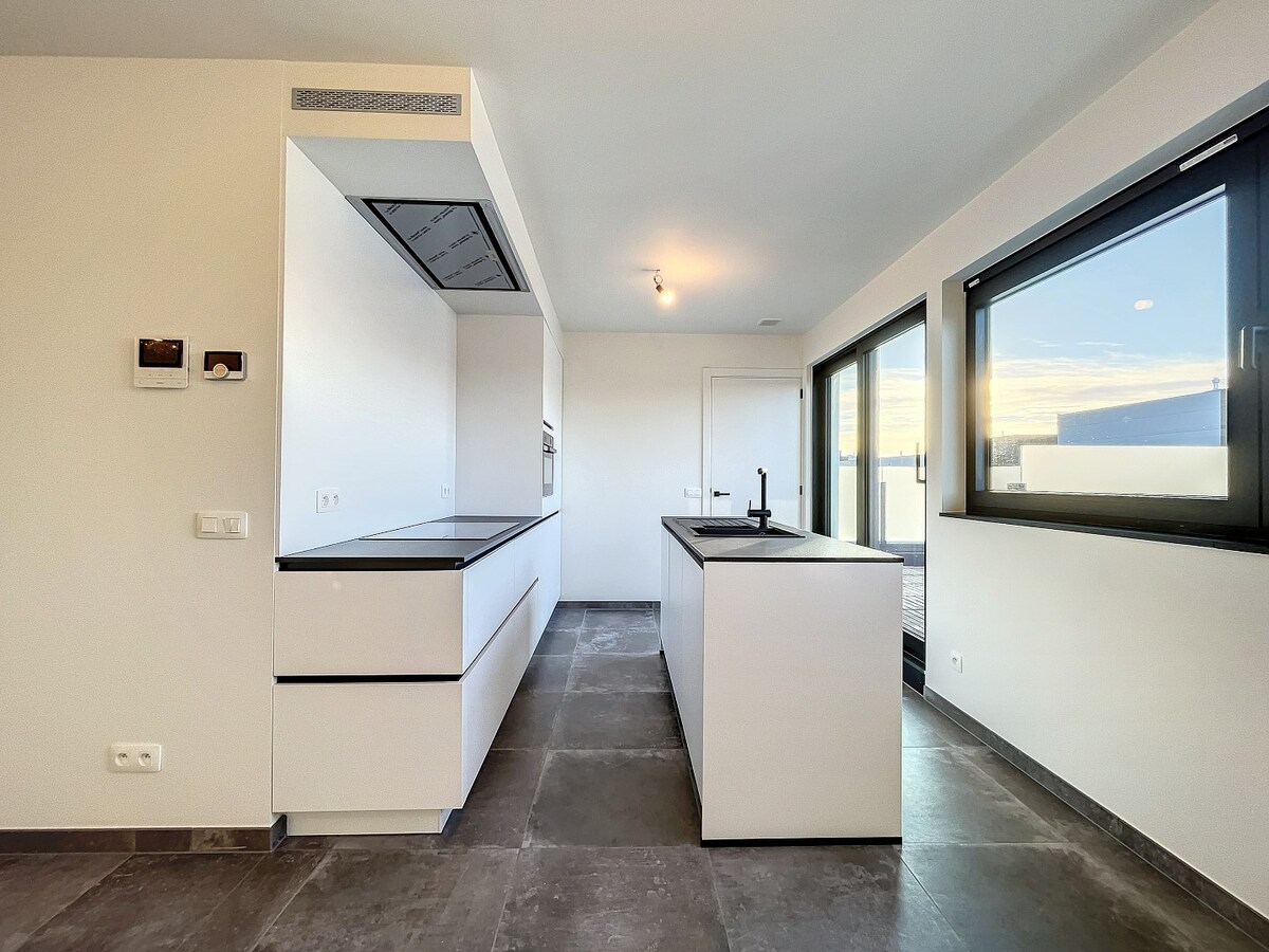 Nieuwbouw penthouse met zonneterras te centrum Zottegem 