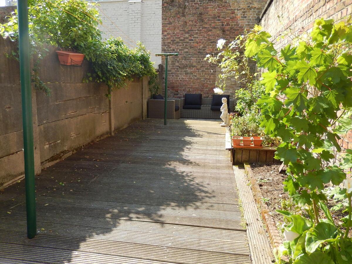 Instapklare stadswoning met 4 slaapkamers en tuin! 