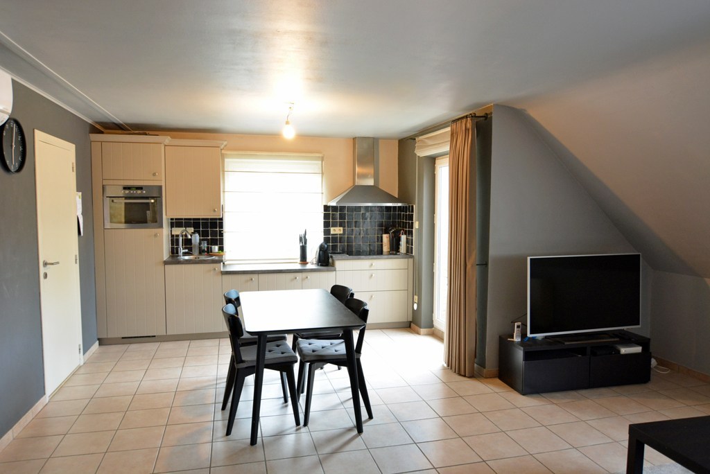 Energiezuinig appartement met 2 slpks, terras en inpandige garage. 