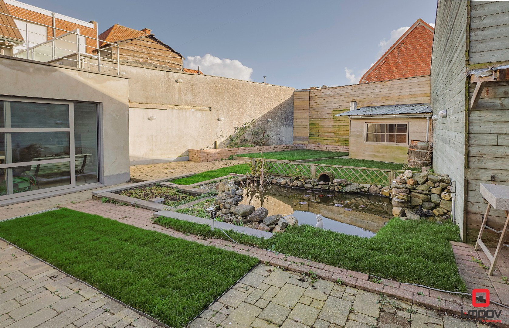 Bel-etagewoning met tuin, loods (450 m²) en tal van mogelijkheden 