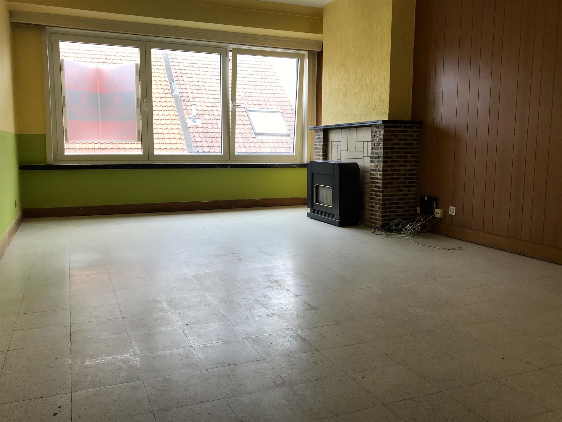 Op te frissen appartement op enkele minuten van markt 