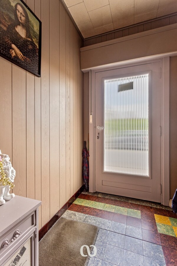 Op te knappen woning met 3 slaapkamer, oprit en garage op toplocatie 