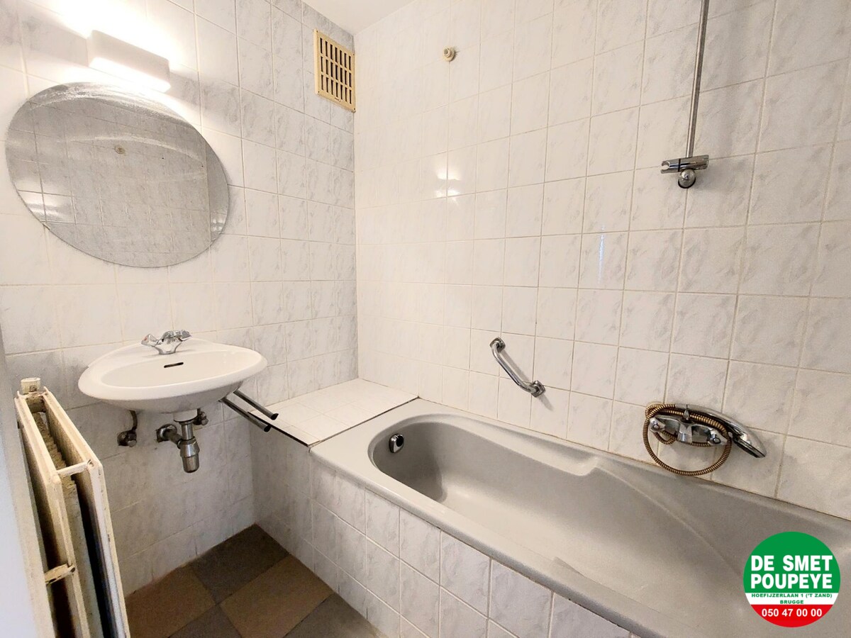 GELIJKVLOERSAPPARTEMENT MET TUINTJE 