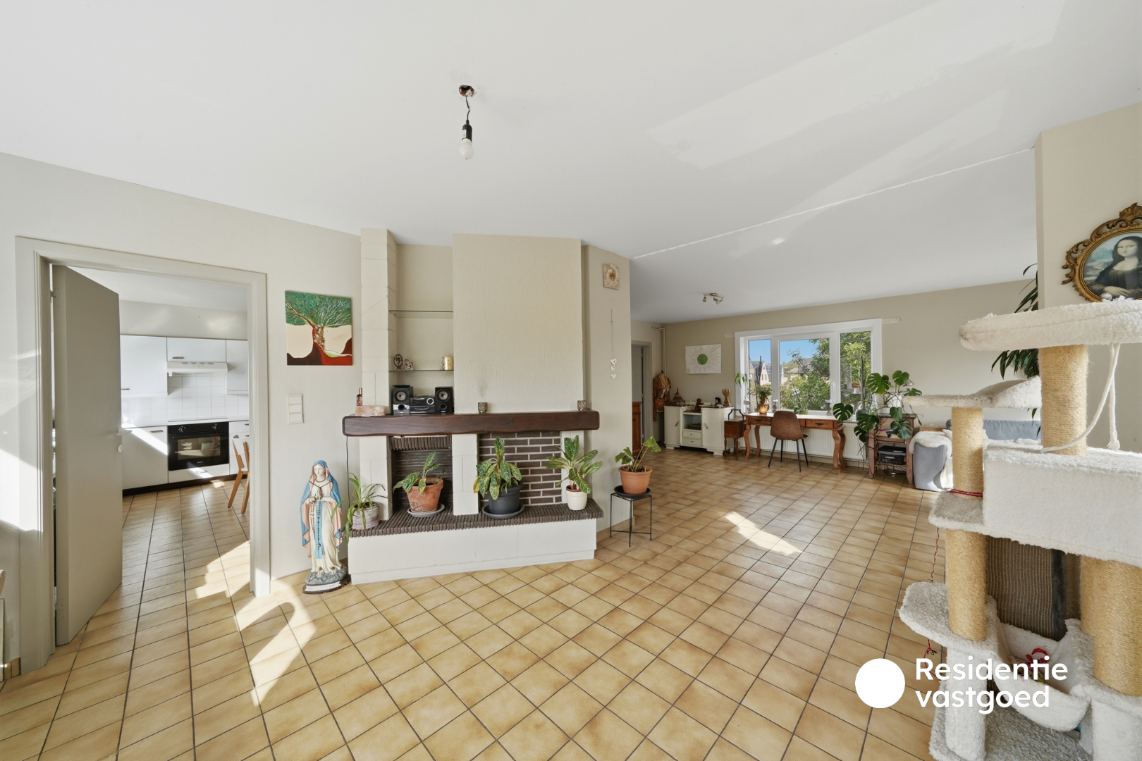 Opbrengsteigendom met 3 appartementen, garage en zonnig terras 