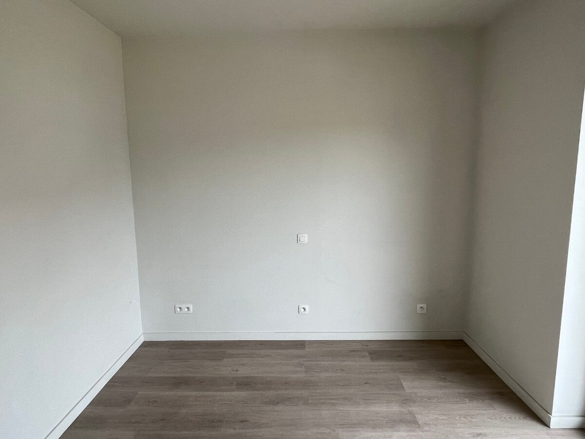 Hoogwaardig, eigentijds appartement met ondergrondse staanplaats 